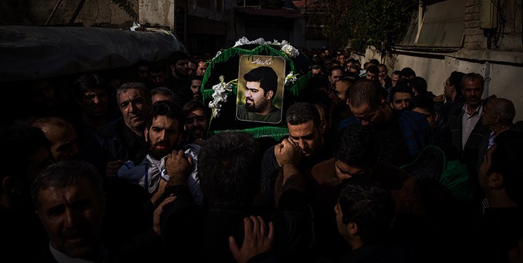 دستنوشته رهبری بر تصویر شهیدجهادگر